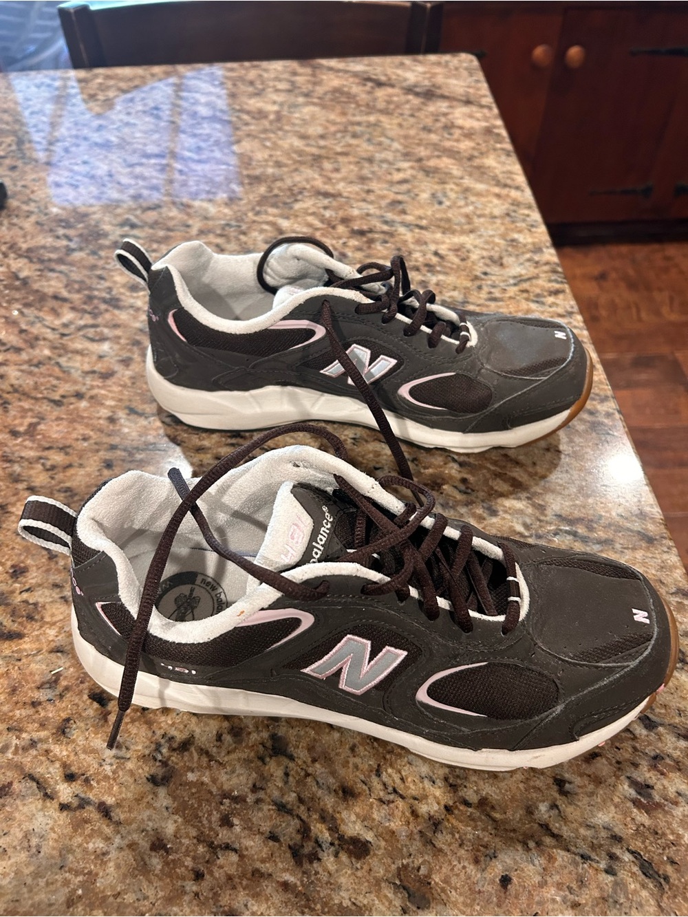 New Balance Women's Dark Brown Sneakers with Pink Accents